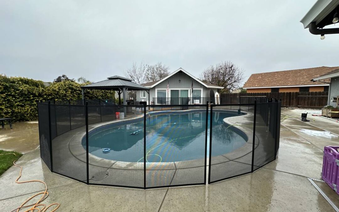 Swimming Pool Fence Guards the Pool
